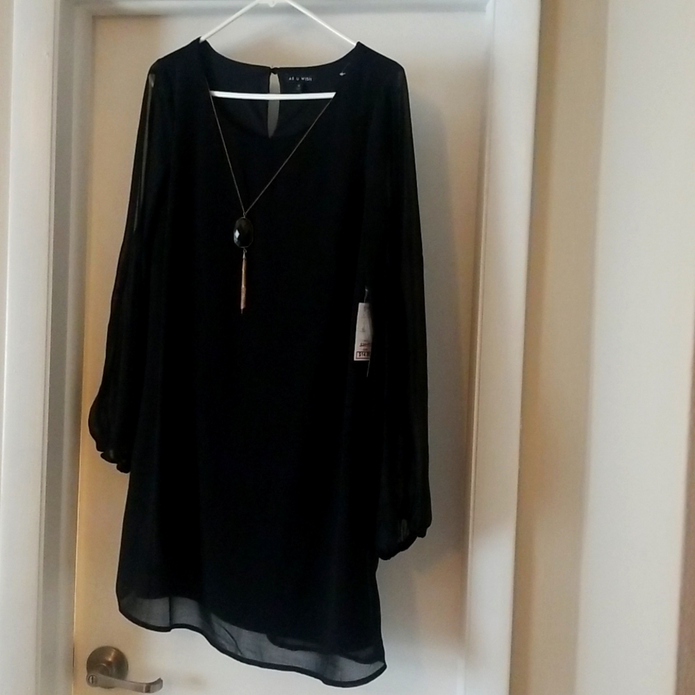 Brand new black dress never worn. As you Wish Brand size M